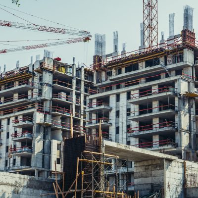 Building cranes on construction site in Tel Aviv, Israel